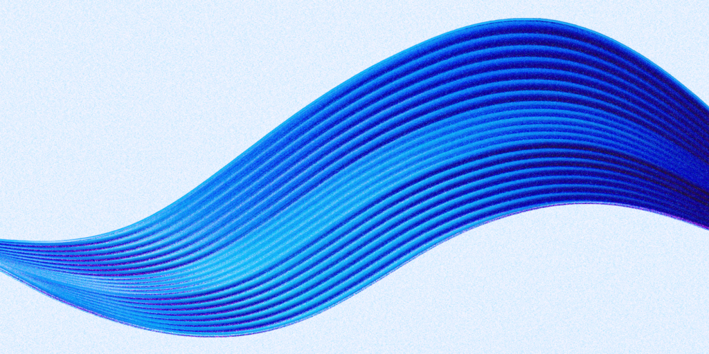 Abstract blue wave on a white background. The wave is smooth and undulating, and it appears to be moving from left to right.